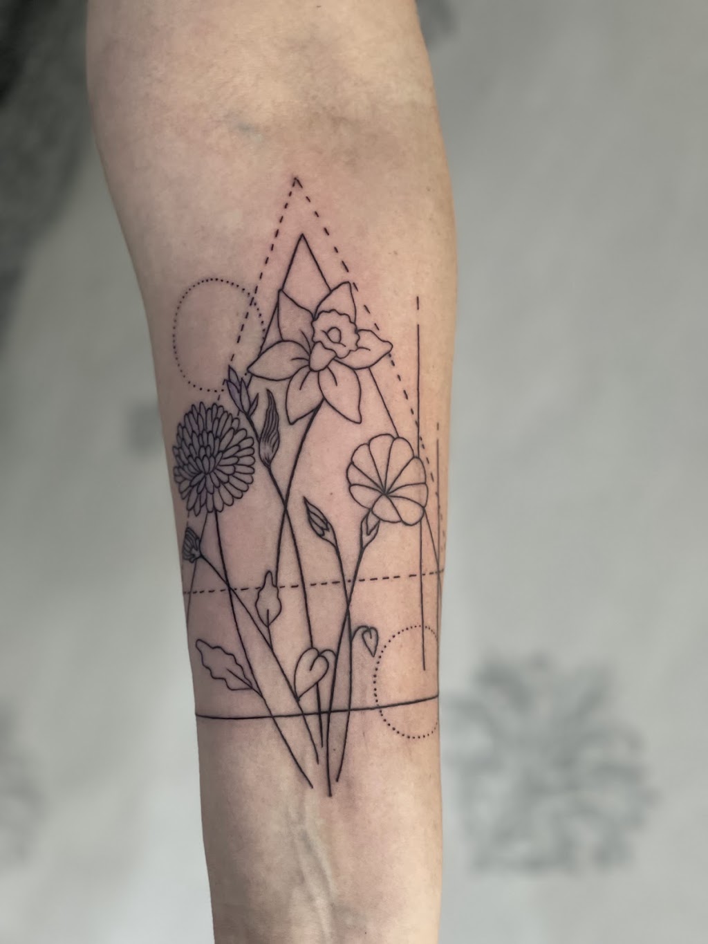 Fine Line Ink Tattoo